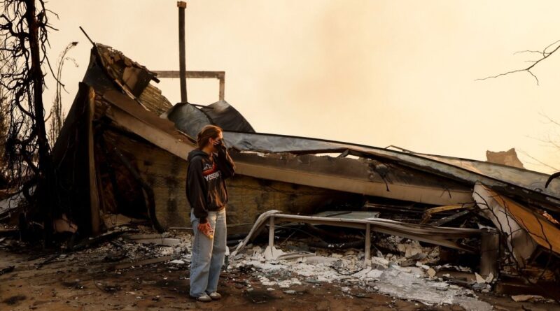 With Their LA-Area Homes Still Smoldering, Families Return to Search the Ruins for Memories